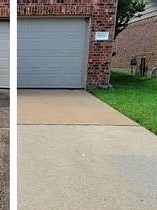 Clean concrete driveway after professional pressure washing in Meridian